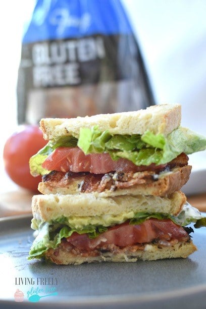 Gluten Free BLT Sandwich cut in half on a plate 