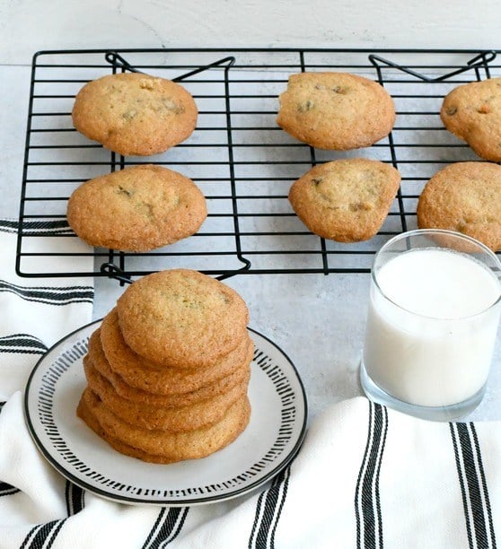 gluten free chocolate chip cookies on a plate with milk