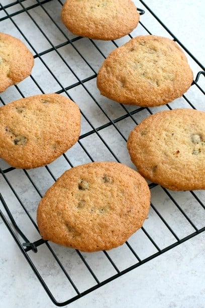 Gluten Free Chocolate Chip cookies on a cooling rack 