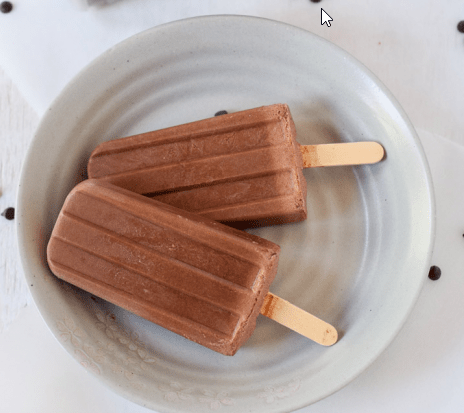 dark chocolate popsicles on a bowl 