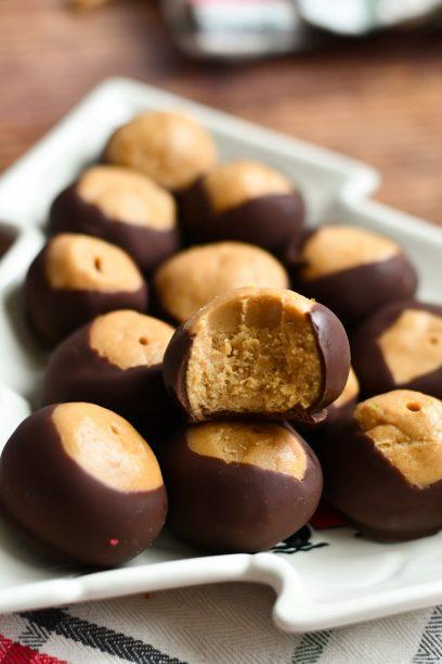 buckeye balls on a plate with a bite taken out
