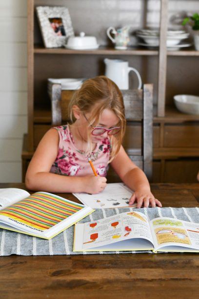kids doing coursework from the bookshark science curriculum 
