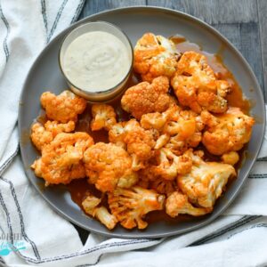 plated buffalo cauliflower bites with a side of ranch