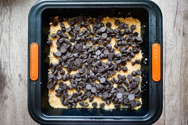 Step 4: Sprinkle the chocolate chips evenly over the crust.
